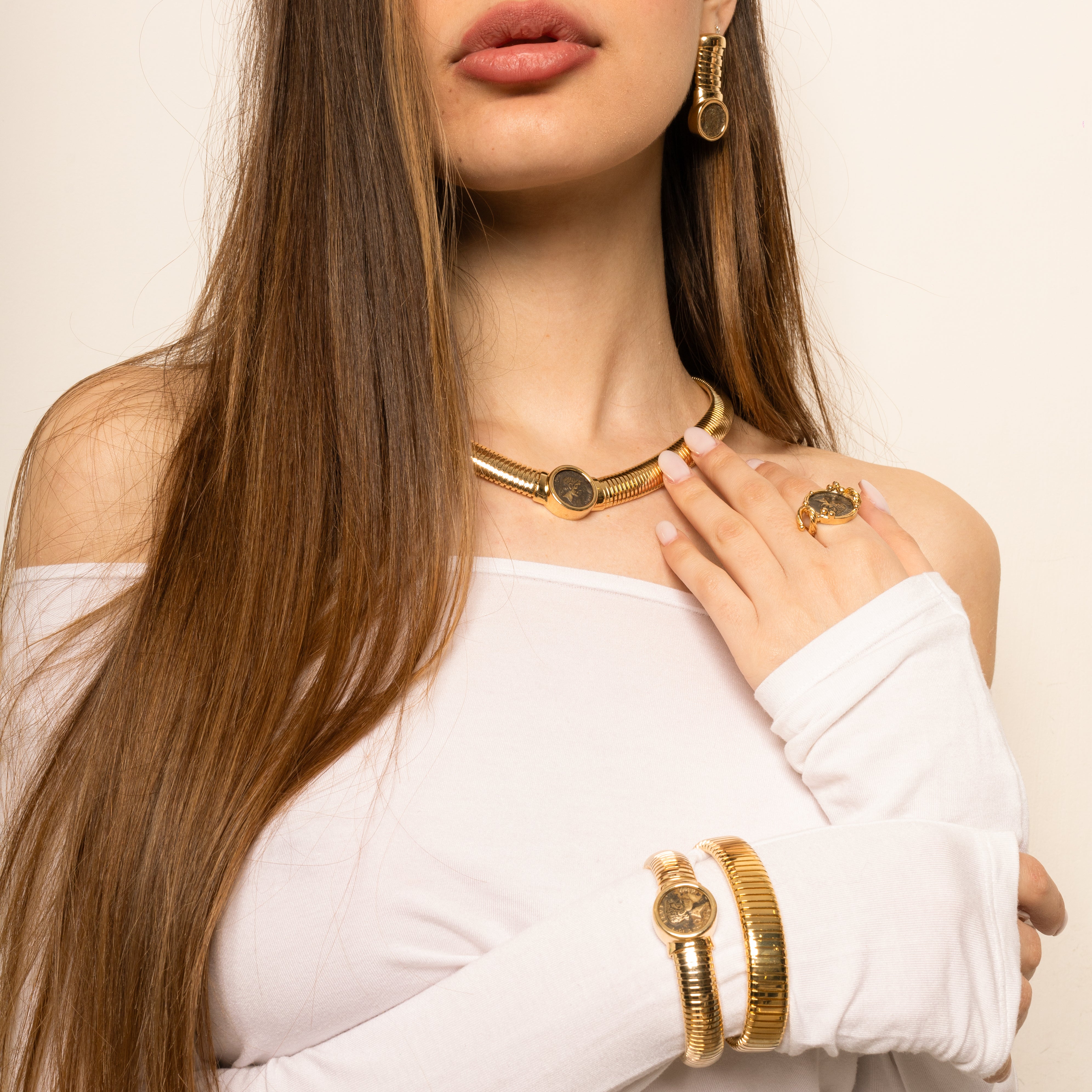 Orecchini tubogas moneta