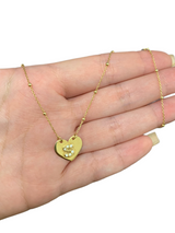 Necklace with heart and letter in zircons